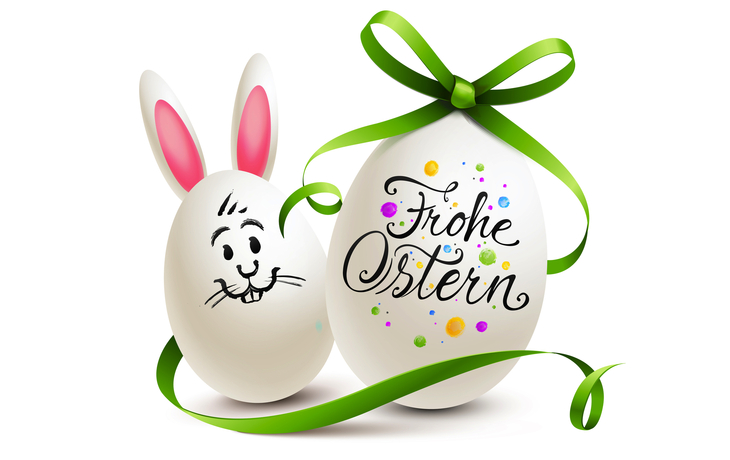 Ostereier mit Frohe Ostern, Schleife, Hase und bunten Punkten.